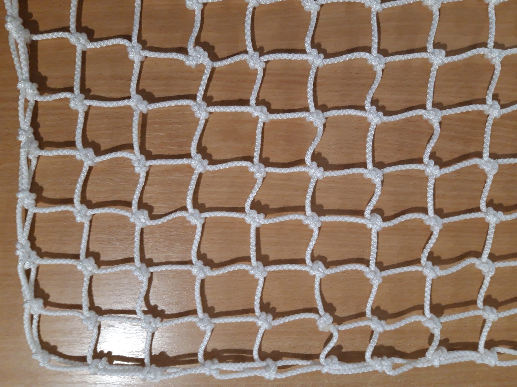 Сітка загороджувальна капронова (поліамід), d=4 мм, осередок 4.5 см, біла 1 Сітка загороджувальна капронова (поліамід), d=4 мм, осередок 4.5 см, біла